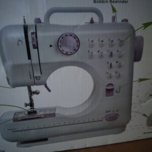 Source Unknown White and Purple Sewing Machine